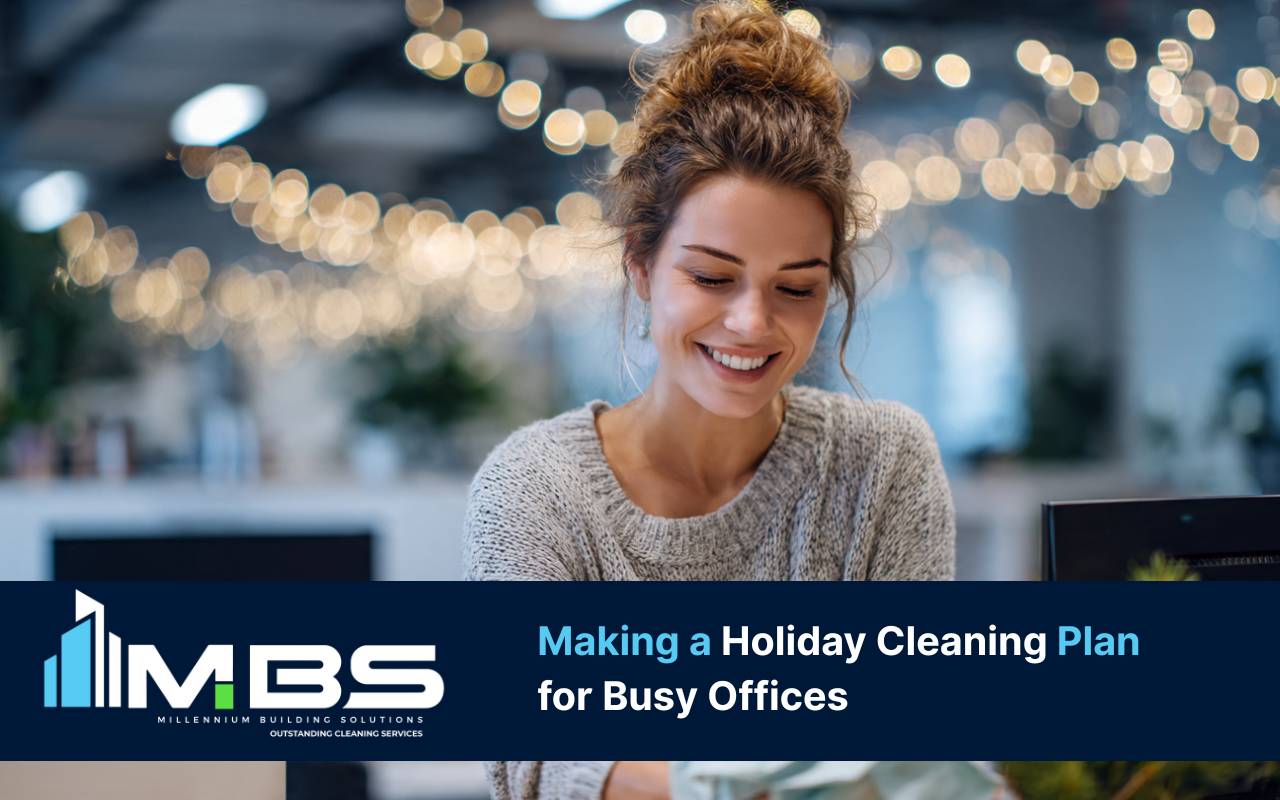 Team following a holiday office cleaning plan in a busy office break room