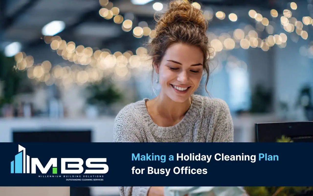 Team following a holiday office cleaning plan in a busy office break room